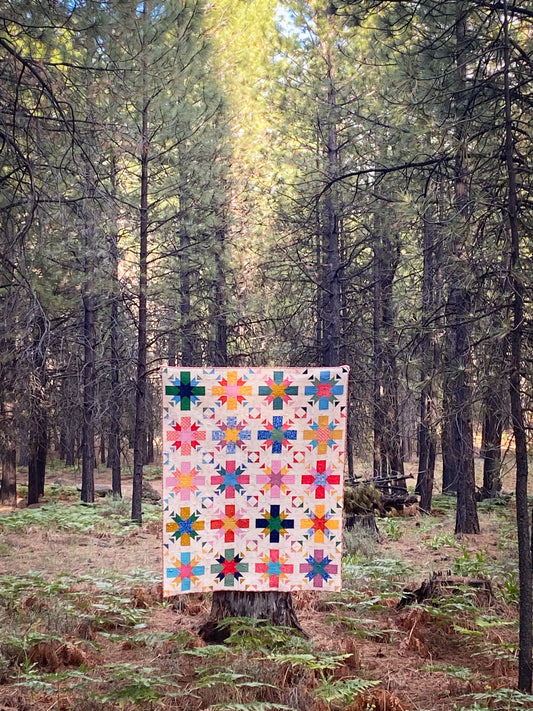 The Sunrise Star Quilt Featuring Ruby Star Society